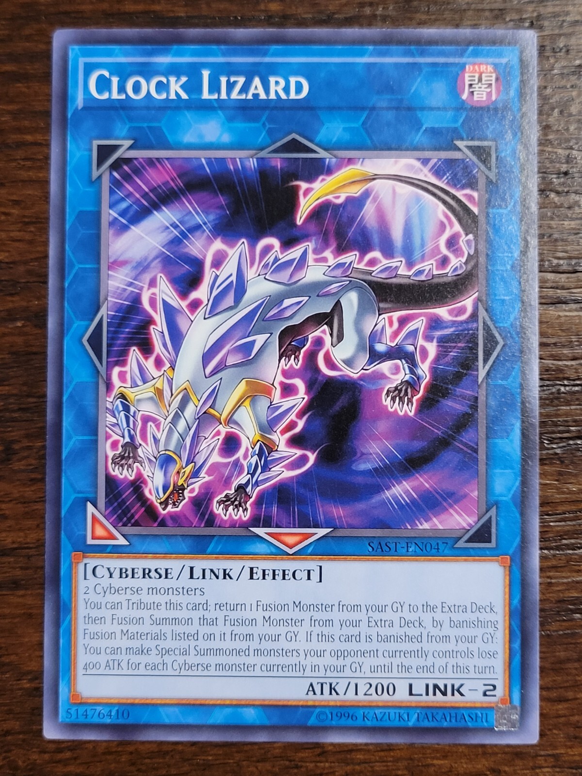 Clock Lizard - SAST-EN047 - Savage Strike - Unlimited - Common