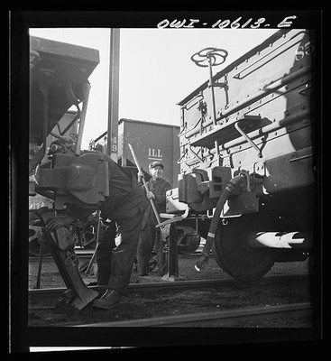 Chicago Illinois 1942 Illinois Central Railroad yard car repair tracks workers