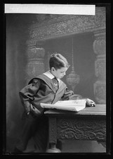Photo:Roland Barber Child Reading Book Portrait