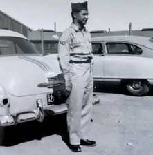 WWII Era US Soldier in Uniform Standing by Vintage Cars Photo