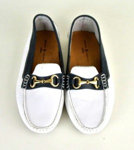 white loafers gold buckle