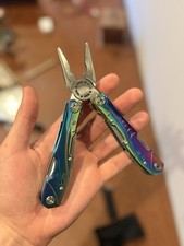 Rainbow Finish 14-in-1 Multi-Tool Pliers w/ N...