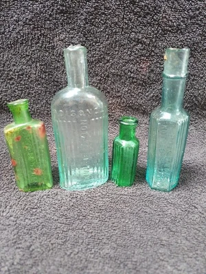 4 Vintage Poison NTBT Poisonous Glass Bottles Aqua & Green Decor Collectable Lot - Image 1 of 4