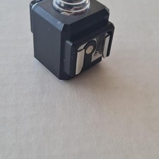 Optical slave trigger for photographic flash units