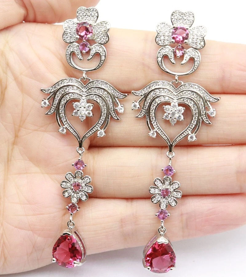 Pink heavy earrings deals