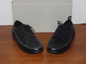 black and white hush puppies