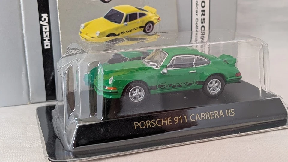 Coche modelo fundido a presión verde Kyosho 1/64 Porsche 911 CARRERA RS abierto para fotos Foto 2 de 4