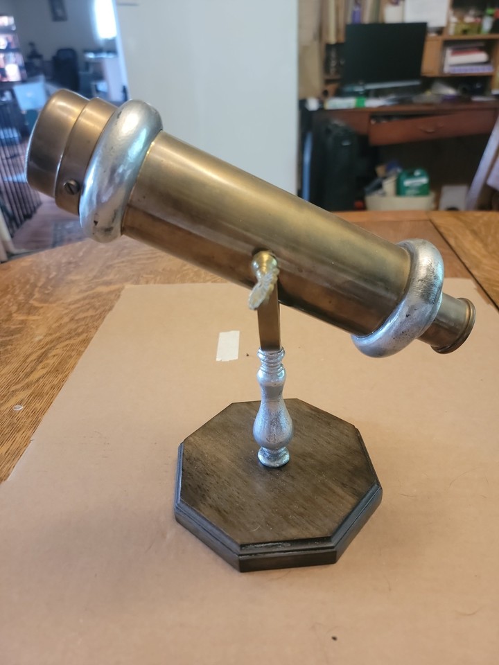 A genuine 1930s parlor tabletop kaleidoscope in brass, glass, aluminum, and wood — a museum-worthy conversation piece from a century ago.