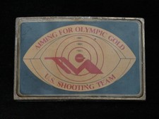 OE21108 VINTAGE 1984 US SHOOTING TEAM AIM FOR OLYMIC GOLD SPORTS BELT BUCKLE