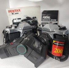2 X Asahi Pentax K1000 35mm Camera W/ SMC Pentax-M 1:2 50 Mm Lenses Flash Book