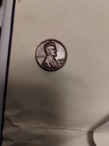1957 D Error L(Liberty) Close To The Rim,BE(Liberty) touching rear one 