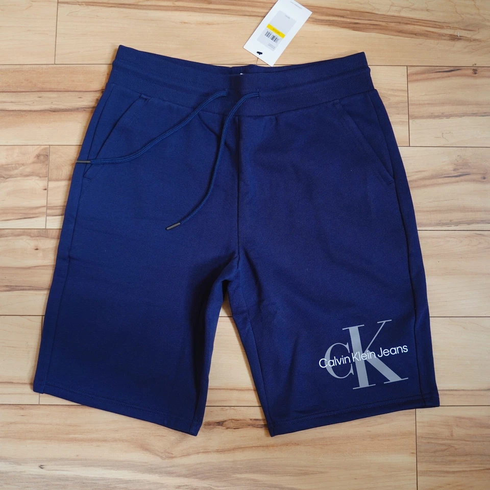 NWT Calvin Klein Jeans Men's Regular Fit Drawstring Monogram Logo Fleece Shorts - Image 2 of 4