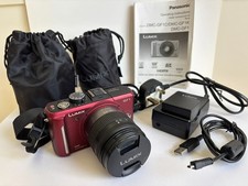 Panasonic Lumix DMC-GF1 red camera with 2 lenses & other accessories