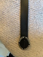 Calvin Klein Black Leather Belt with Circular Metal Emblem