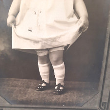 Antique Photo Little Girl doing Curtsy Early 20th Century 4x6 in original Mat