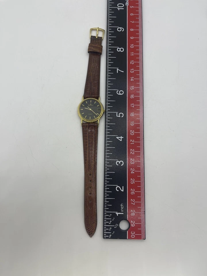 Reloj de cuarzo Movado de colección para mujer 87.A6.825M tono dorado cara negra fecha correa de cuero Foto 3 de 4