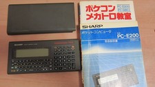 Sharp PC-E200 Pocket Computer with Manual Tested Used