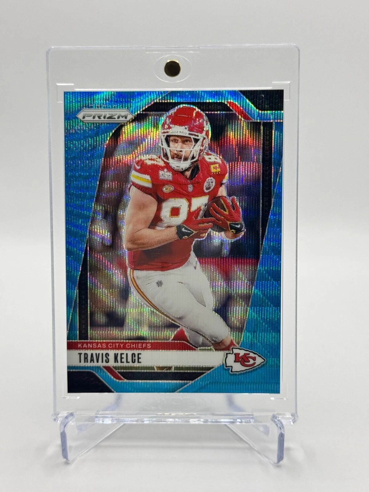 2024 Panini Prizm #140 Travis Kelce Blue Wave Prizm /230 Kansas City Chiefs