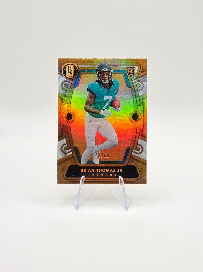Brian Thomas Jr. 2024 Panini Gold Standard RC White Gold SP /65 #120 Jaguars