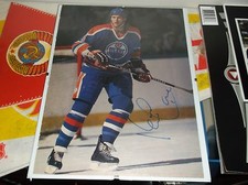 KEVIN LOWE EDMONTON OILERS AUTOGRAPHED 8.5 X 11 MAGAZINE PHOTO (A)