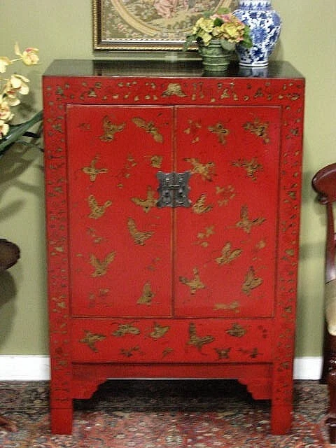 ORIENTAL RED PAINTED 2 DOOR STORAGE CABINET WITH GILT BUTTERFLY DECORATION. - image 2 of 4