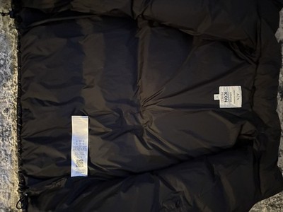 an Armani Exchange ''Icon Period'' puffer jacket in black.