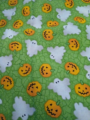spooky  ghost and pumpkin  material  1 1/4 yrds