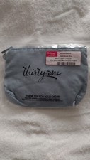 Thirty-one mini zipper pouch, stone blue color. New in package