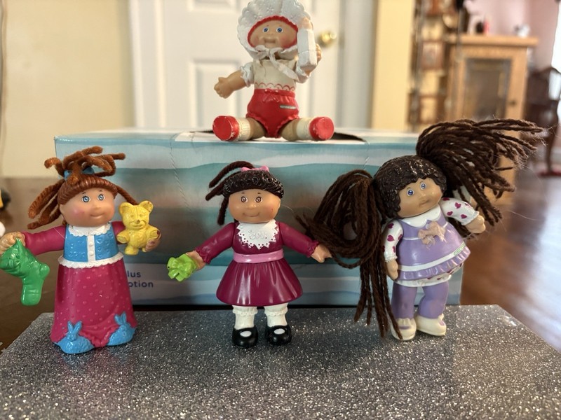 Vintage Cabbage Patch Kids mini figurines similar to those released in the 1990s