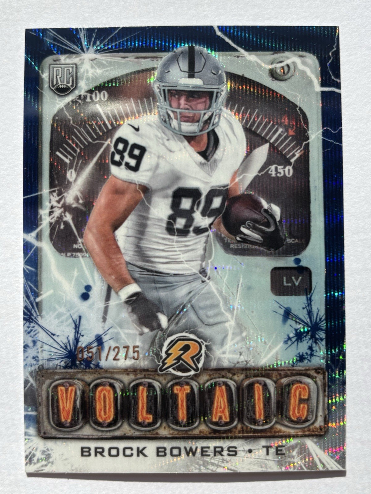 2024 Topps Resurgence Voltaic Brock Bowers #V-7 Navy Surge Refractor 51/275 (RC)