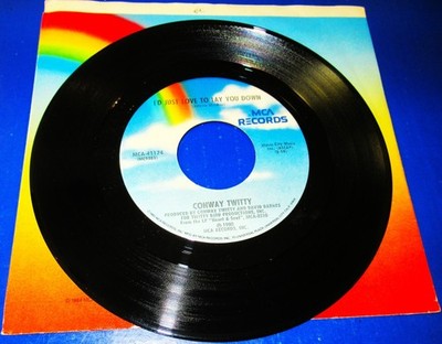 Conway Twitty, I'd Just Love To Lay You Down / She Still Thinks I Care
