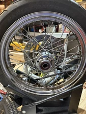 Chrome Laced Front Wheel for A Harley-Davidson Motorcycle. Used
