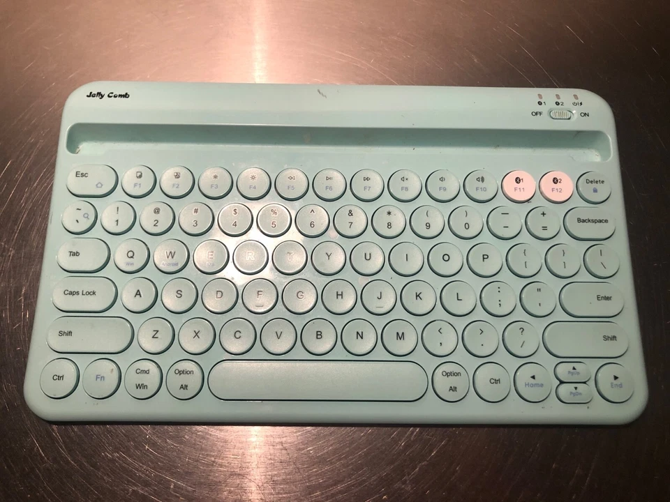 Teclado inalámbrico Teal multidispositivo Bluetooth Jelly Comb en muy buen estado Foto 3 de 3