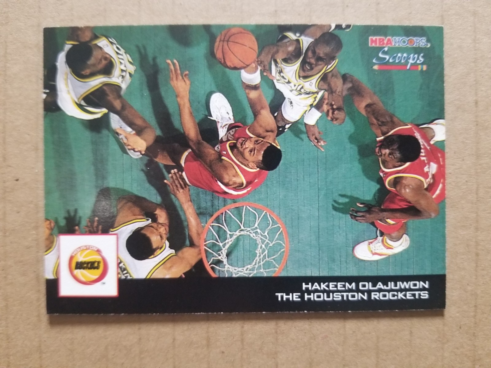 Hakeem Olajuwon #HS10 Basketball Cards 1993 Hoops Scoops trading card — raw and PSA graded price guide