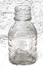 Antique Tiny Bottle w Embossed Little Boy Sitting In Profile 2" Tall Baby Doll