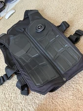 vr suit pro used twice  from haptics fits everyon its black and has a blututh.  