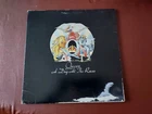 A Day At The Races by Queen EMI EMTC 104, 1976 Orig Inner, damaged sleeve 1U/1U.