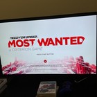 PS3 Need for Speed Most Wanted Hot Pursuit Rivals Run cover with red text, city skyline, and game logos.
