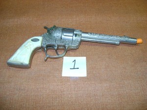 GENE AUTRY CAP GUN, LESLIE HENRY CAP GUN , HUBLEY TOY CAP GUNS