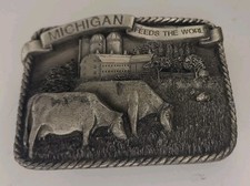 1984 MICHIGAN FEEDS THE WORLD BELT BUCKLE E-26 BERGAMOT BRASS WORKS MADE IN USA