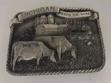 1984 MICHIGAN FEEDS THE WORLD BELT BUCKLE E-26 BERGAMOT BRASS WORKS MADE IN USA