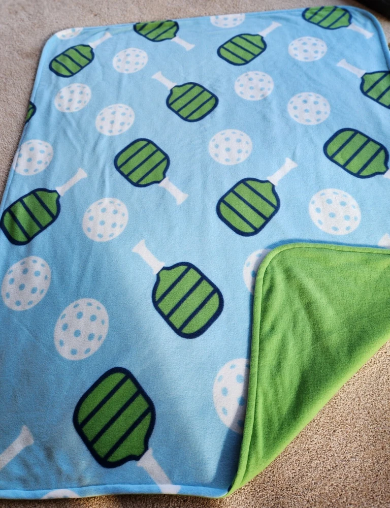 Pickleball Print Fleece Throw Blanket 48" x 60" Blue Reversible to Solid Green