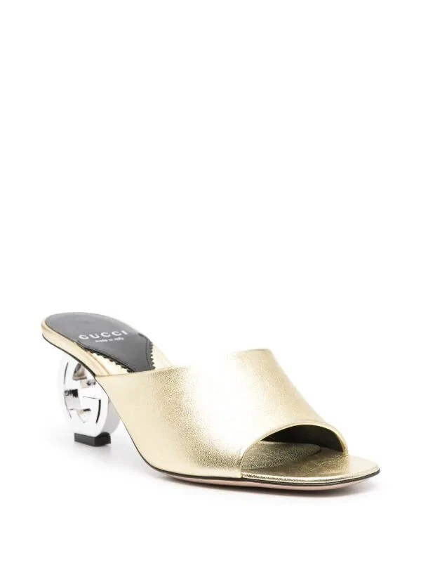 Mules à enfiler plaque logo Gucci