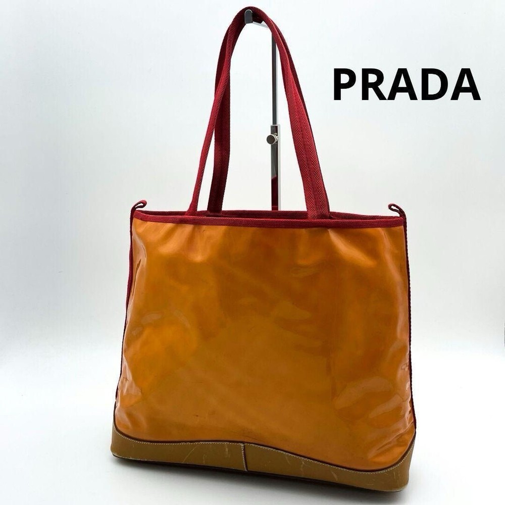 Prada orange patent leather tote bag with gold hardware