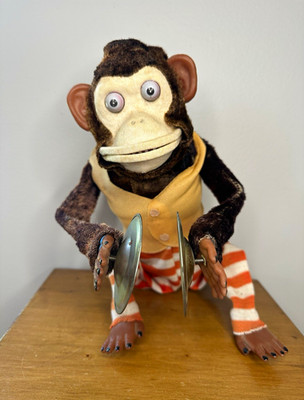 Jolly Chimp Musical Monkey Doll. Does turn on but doesn t move