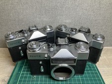 silver chrome Zenit E - Soviet 35mm film camera SLR with M42 lens mount