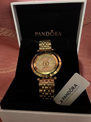 Pandora gold-tone watch in excellent condition. Includes original box.