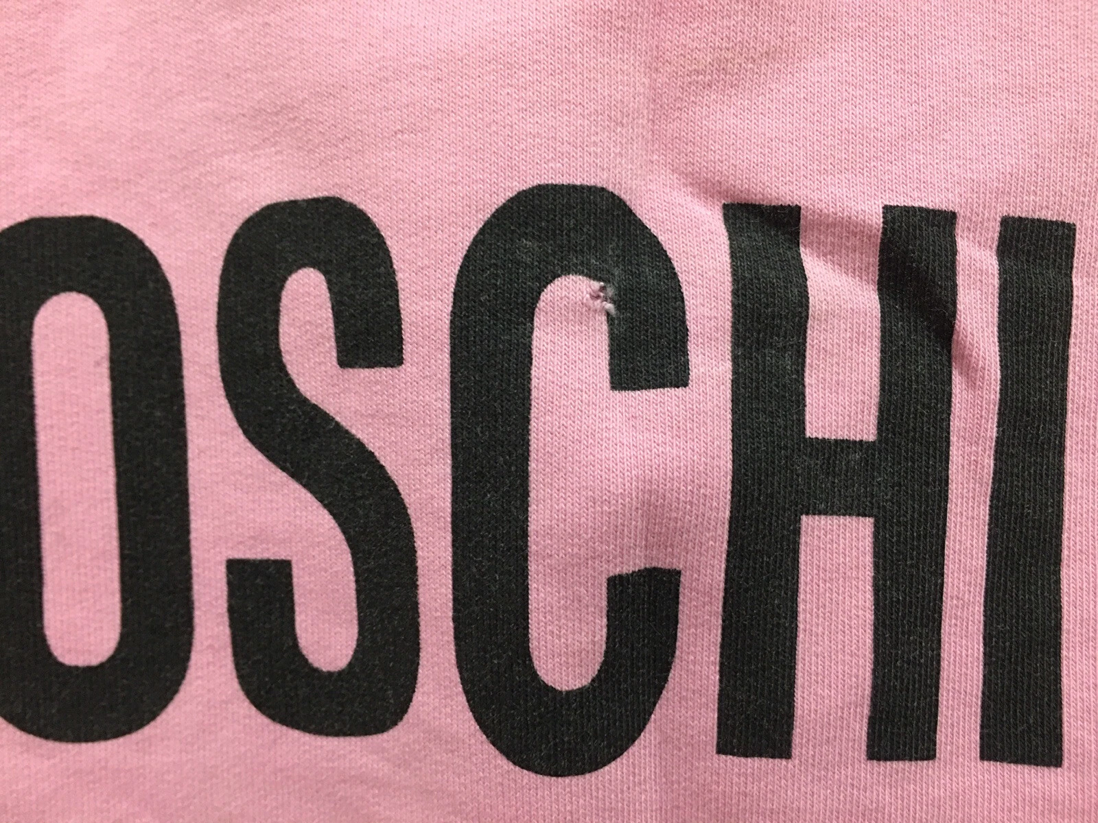 Felpa con cappuccio rosa tagliata per ragazze designer Moschino couture 6 anni ?