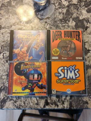 vintage lot of 4 PC games Sims Hercules Deer Hunter Atomic Bomberman