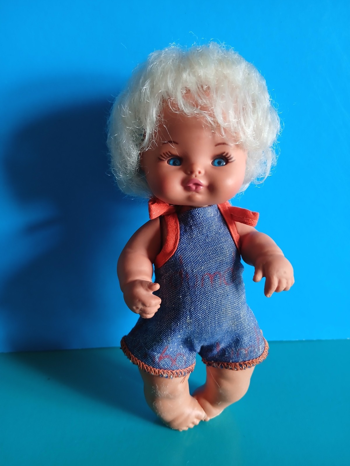 "FURGA" Baby mini bambola, "DUMDO", anni 70, biondo, altezza 15 cm.